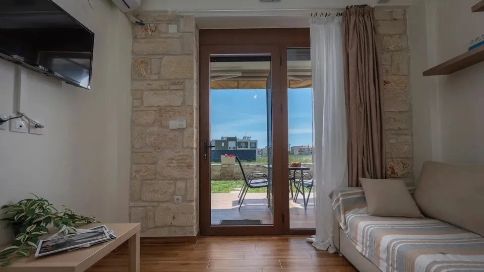 Delejo Resort & Suites, Nea Flogita, Grčka — Comfort Suite Ground Floor